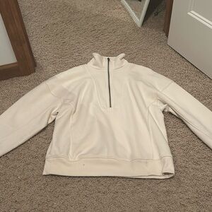Cream quarter-zip sweater